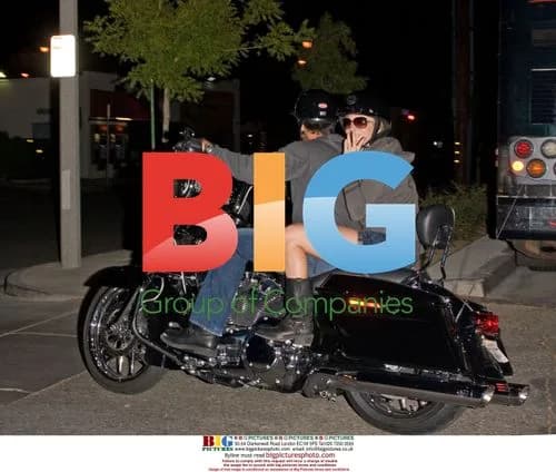 Leann Rimes Performs, Leaves on Motorcycle