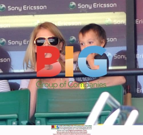 Elin Nordegren and son Charlie at tennis match