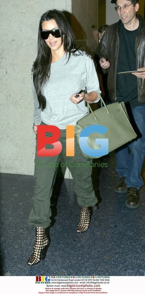 Kim Kardashian Signs Autographs at LAX