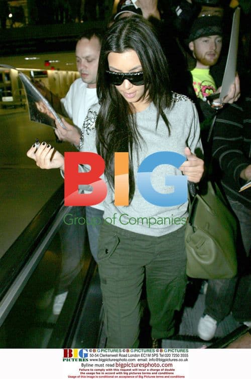 Kim Kardashian Signing Autographs at LAX