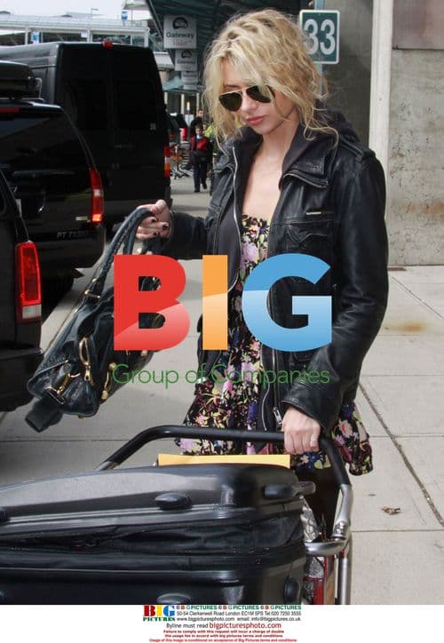 Ashley Tisdale and Aly Michalka at Vancouver Airport