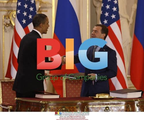 Obama and Medvedev Shake Hands at START Treaty Signing