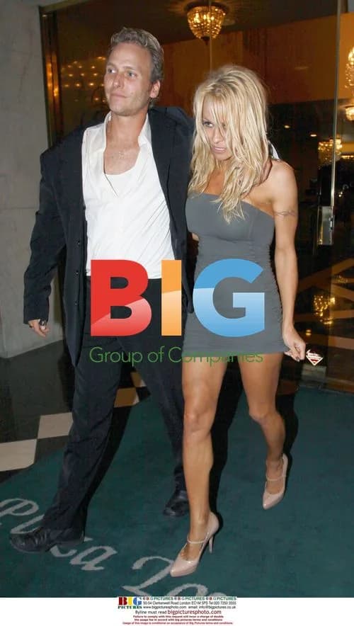 Pamela Anderson Leaves Plaza Towers