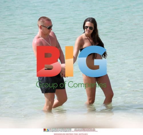 Pregnant Danielle Lloyd Enjoys Beach Day