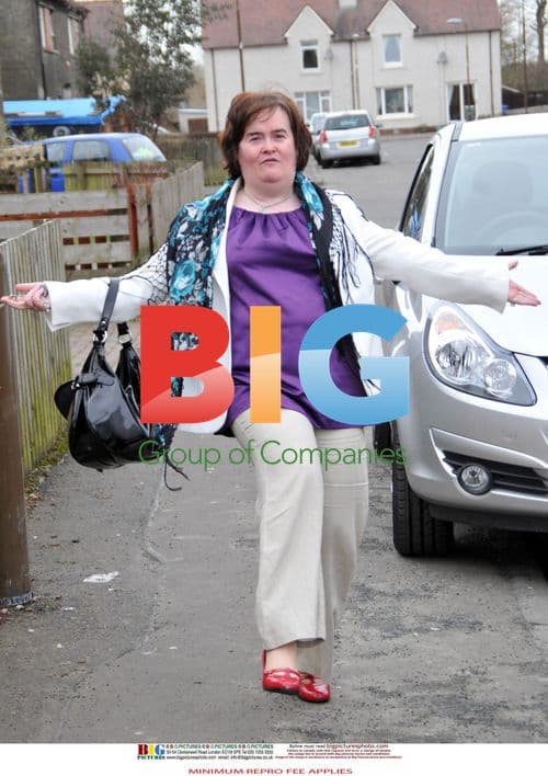 Susan Boyle Poses Outside Home