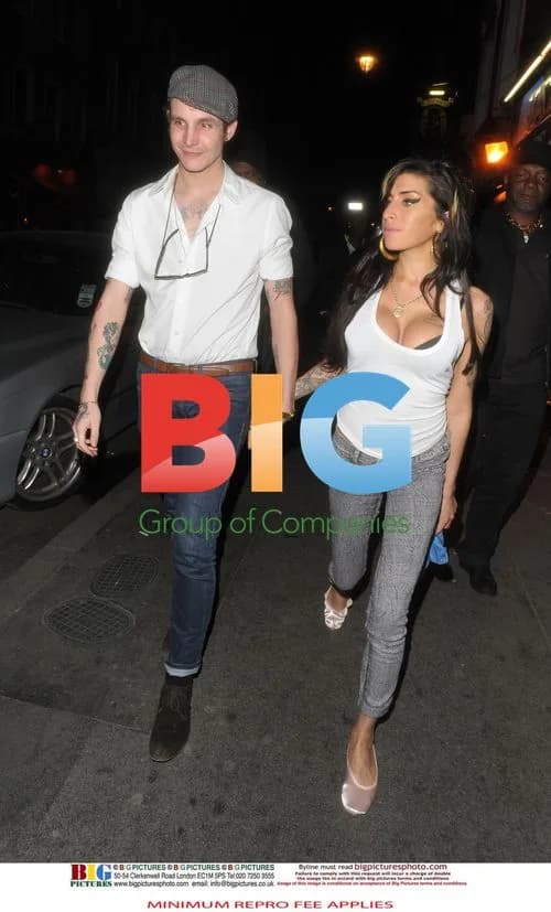 Amy Winehouse and Blake Fielder-Civil Leaving Jazz After Dark