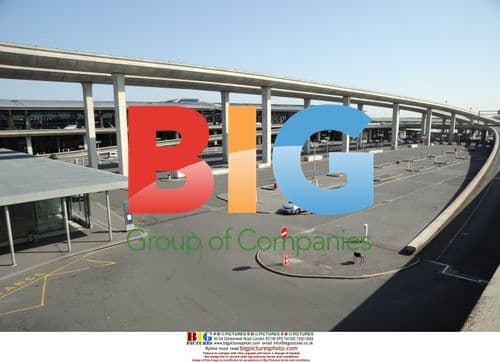 Passenger rests at Paris airport during volcano ash crisis