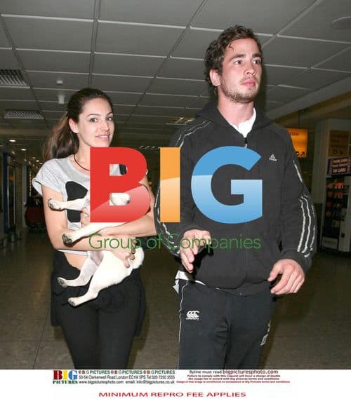 Kelly Brook Surprised by Boyfriend at Airport
