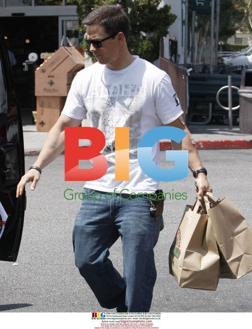 Mark Wahlberg and son leaving store