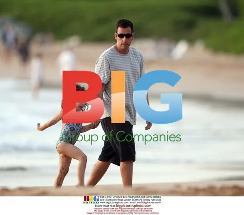 Adam Sandler plays with kids on Hawaii set