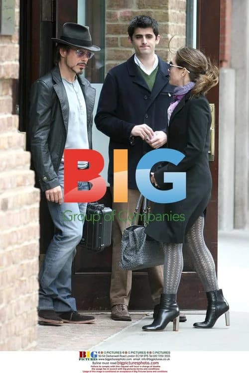 Robert Downey Jr. and Wife Leaving Hotel