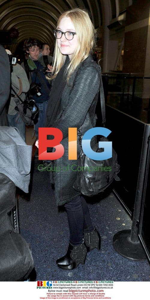 Dakota Fanning Arriving at LAX