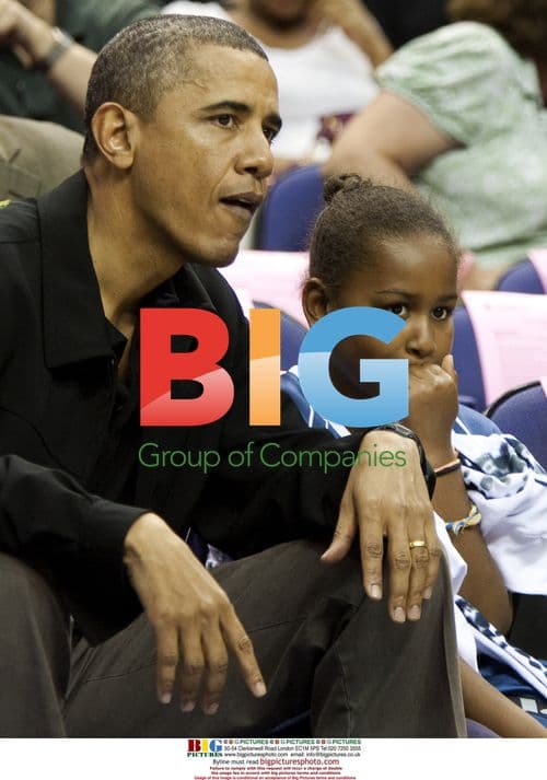 Obama Attends WNBA Game with Daughter