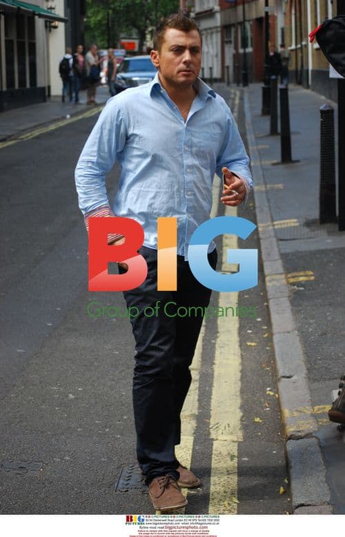 Paul Danan Smoking Outside the Ivy