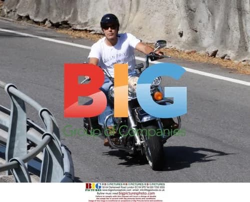 George Clooney Spotted on Bike Ride Amidst Girlfriend's Troubles