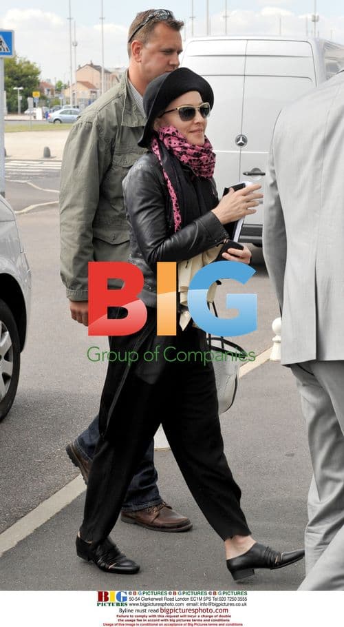 Madonna and Kids at Paris Airport