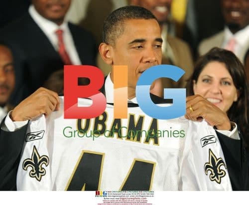 Obama Receives Saints Jersey at White House