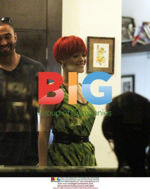 Rihanna Covers New Tattoo in NYC