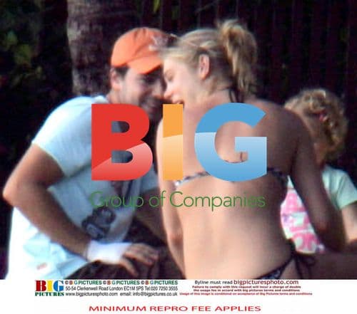 Chelsy Davy Relaxes on Beach Vacation