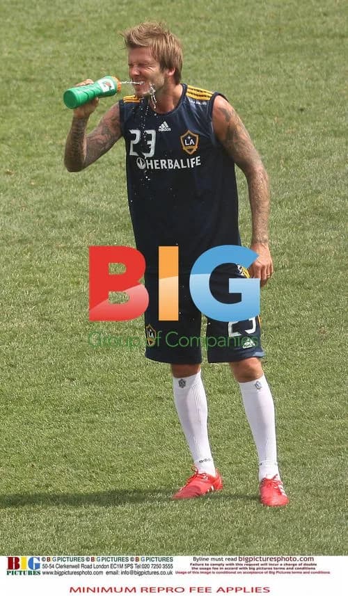 David Beckham practices with teammates