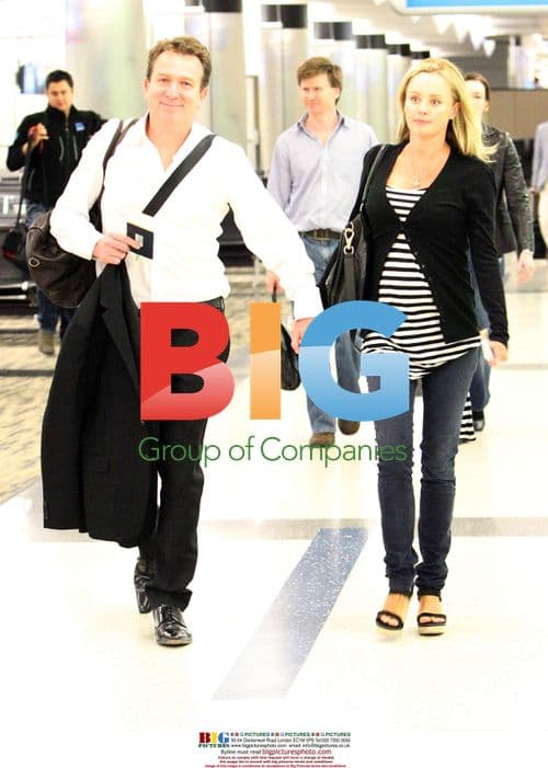 Mark McInnes and Lisa Kelly arrive at LAX