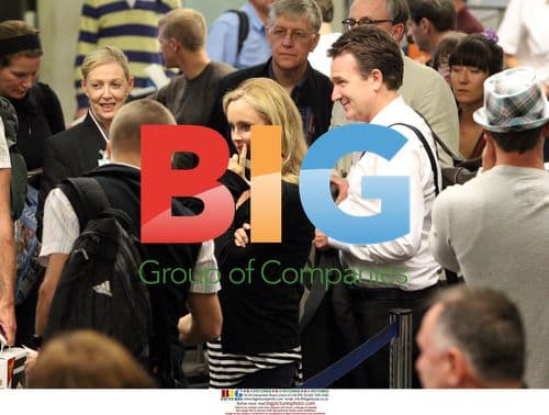 Mark McInnes and Girlfriend Lisa Kelly Arrive at LAX