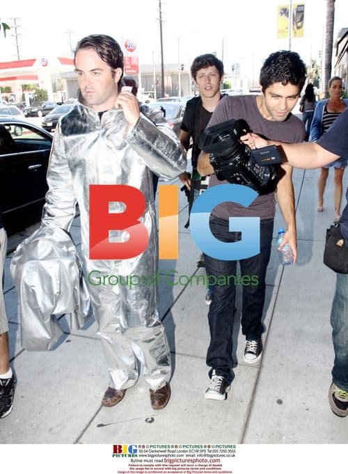 Adrian Grenier with astronaut in West Hollywood