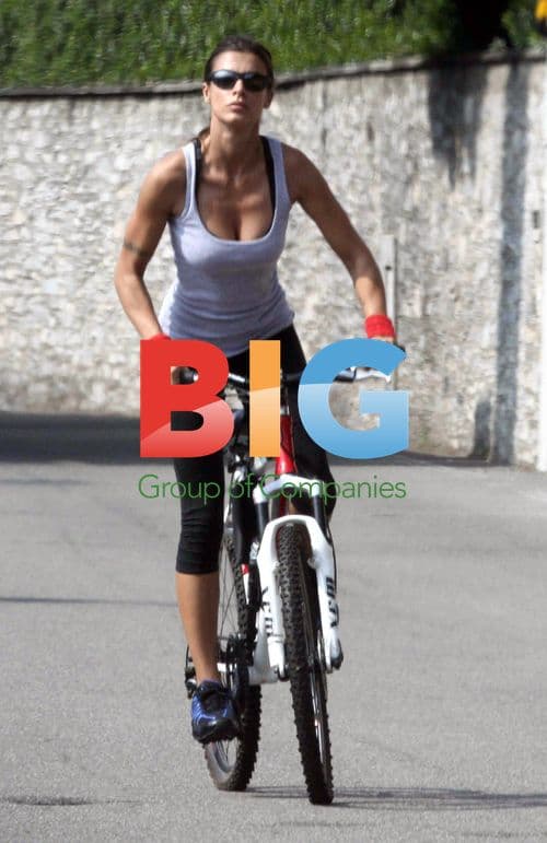 George Clooney Distracted on Bike Ride