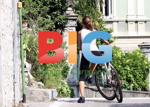 George Clooney rides bike with girlfriend