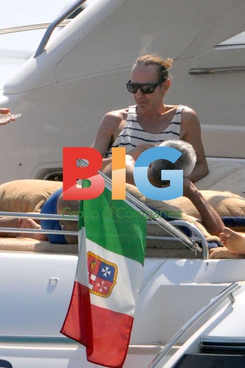 DJ Jeremy Healy on yacht with blonde