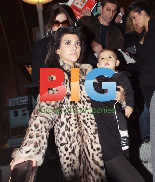 Kardashian Sisters Arrive at LAX