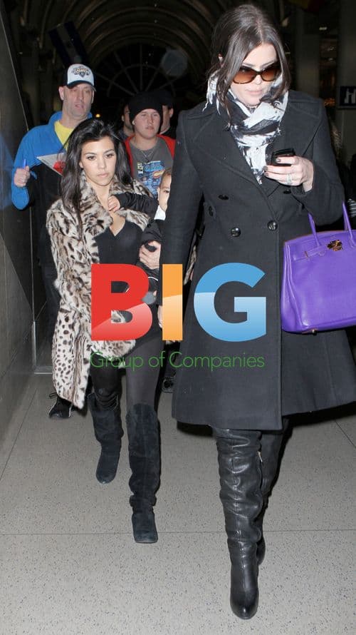 Kardashian Sisters Arrive at LAX