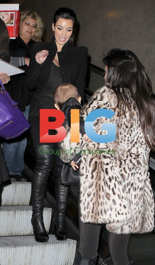 Kardashian Sisters Arrive at LAX with Baby Mason