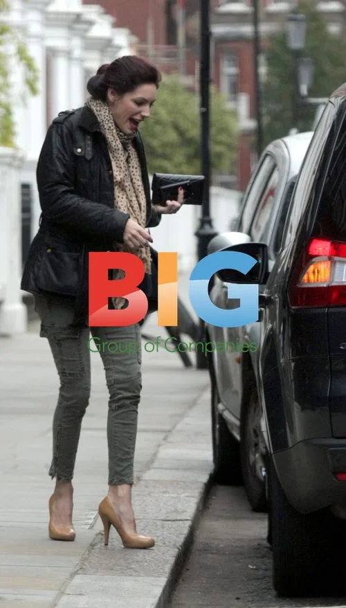 Kelly Brook Leaving Hotel in London