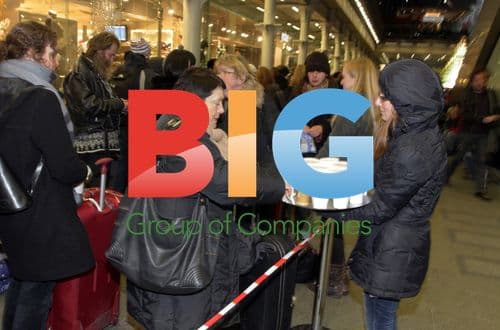 Passengers queue at St. Pancras Station