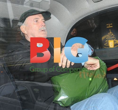 Monty Python Star John Cleese Hails Cab in London