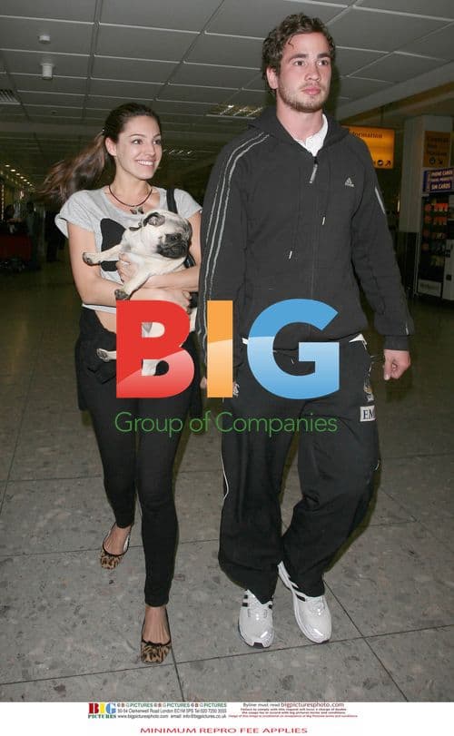 Kelly Brook Reunited with Boyfriend at Airport