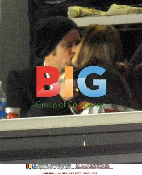 Brad Pitt and Angelina Jolie Kissing at Super Bowl XLIV