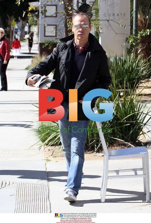 Michael Keaton Relaxing with Newspaper