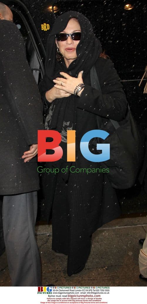 Gloria Estefan Leaves Hotel in Snow