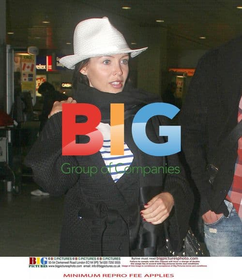 Dannii Minogue and Kris Smith Arrive at Heathrow