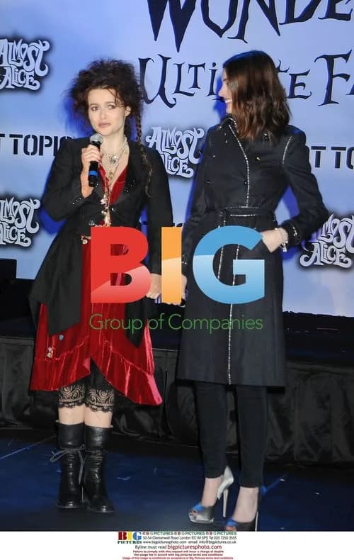 Helena Bonham Carter and Anne Hathaway at Alice in Wonderland concert