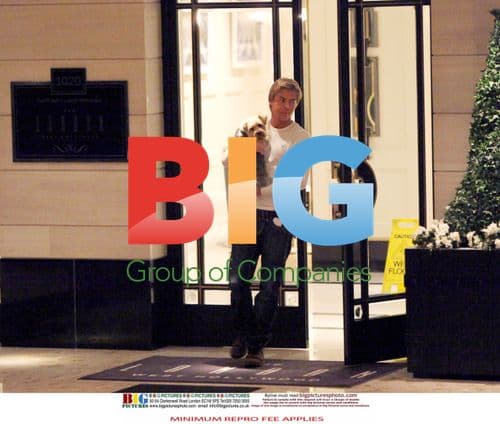 Derek Hough Leaves Cheryl Cole's Hotel