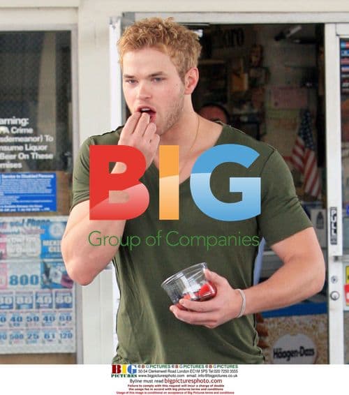 Kellan Lutz fuels up at gas station