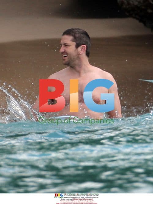 Gerard Butler on Beach in Barbados