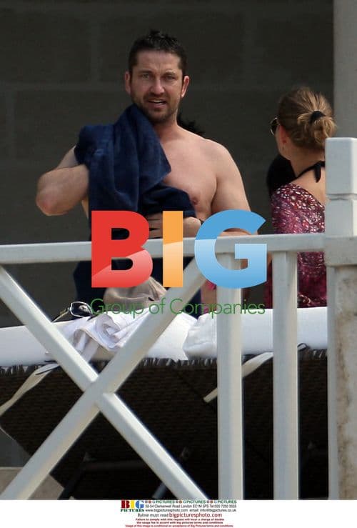Gerard Butler on Beach in Barbados