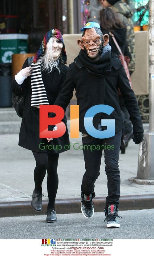 Ashlee Simpson and Pete Wentz in masks