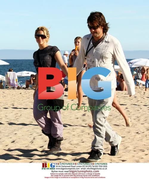 Shakira and boyfriend on beach in Uruguay