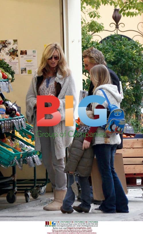 Rod Stewart and Penny Lancaster with son in France