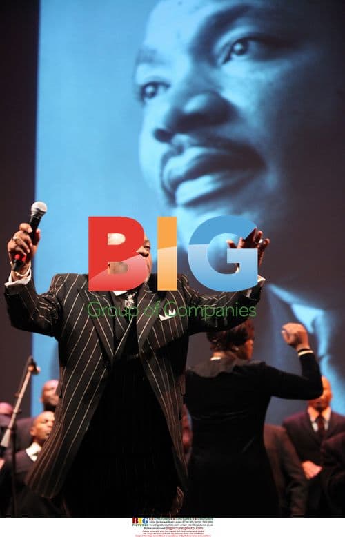 Bishop Eric Figueroa performs with Mass Choir